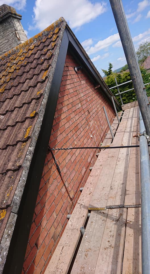 Scaffolding around roof for repair