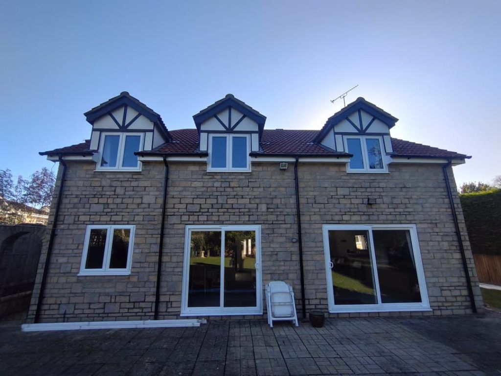 large house with new tiled roof