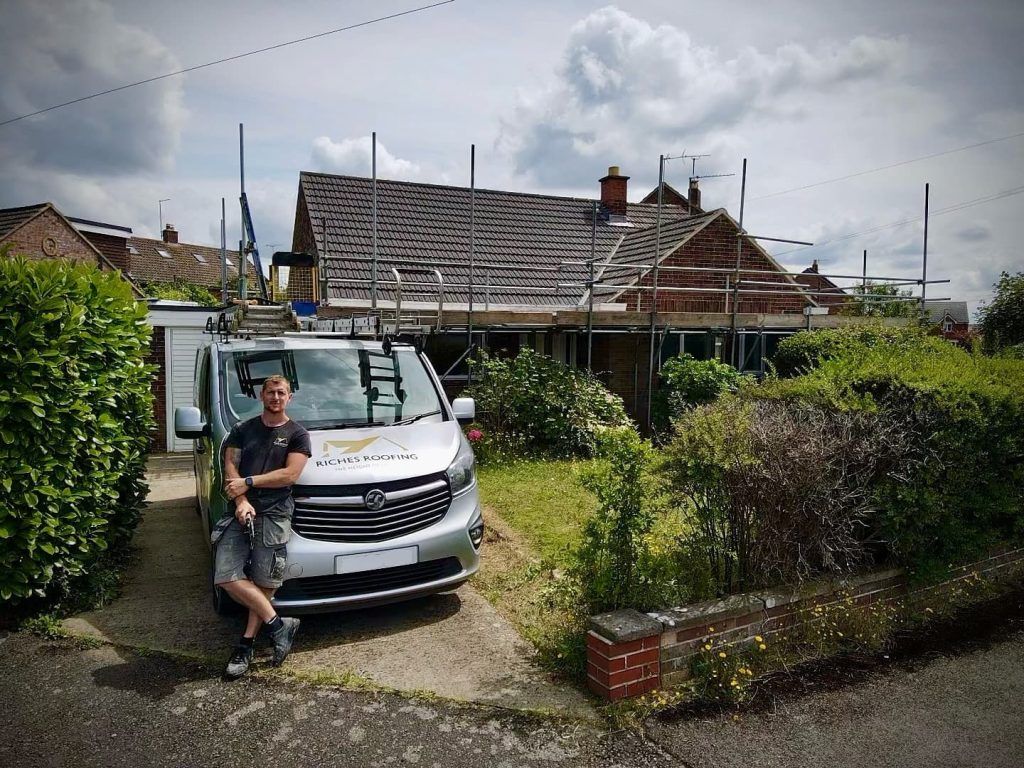 About us - riches roofing owner and van